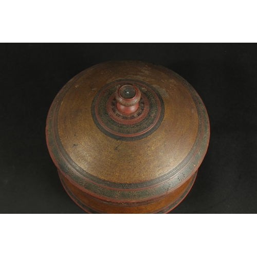 242 - AN EARLY 19TH CENTURY INDIAN LACQUERED WOODEN TURBAN BOX, 24cm wide.