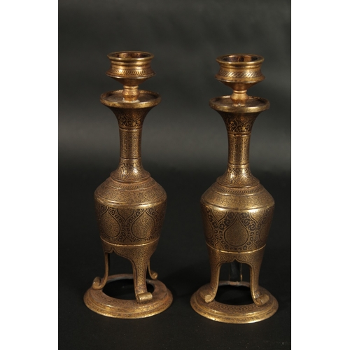 244 - A VERY FINE PAIR OF 19TH CENTURY  NORTH INDIAN GOLD INLAID STEEL CANDLESTICKS, 18.5cm high.