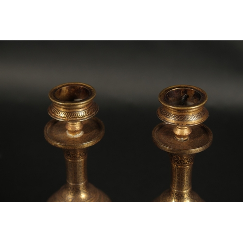 244 - A VERY FINE PAIR OF 19TH CENTURY  NORTH INDIAN GOLD INLAID STEEL CANDLESTICKS, 18.5cm high.