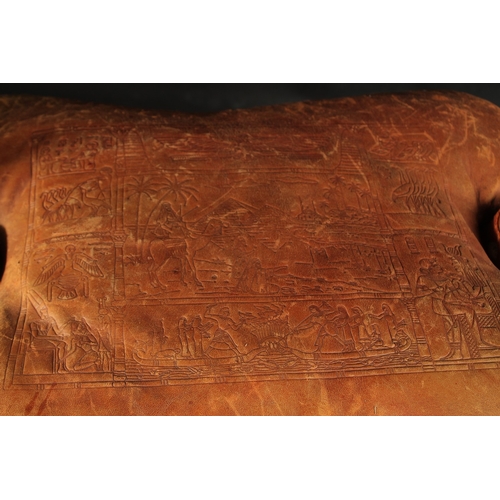 249 - A MID 20TH CENTURY CARVED WOOD CAMEL SEAT, with leather top.