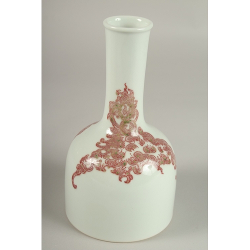 25 - A CHINESE UNDERGLAZE RED AND WHITE PORCELAIN BOTTLE VASE, the base with character mark, 19.5cm high.