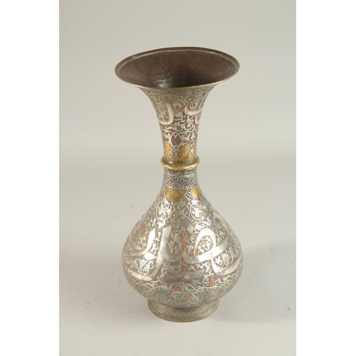 253 - A FINE 19TH CENTURY SYRIAN SILVER AND COPPER INLAID BRASS VASE, with large bands of calligraphy, 36c... 