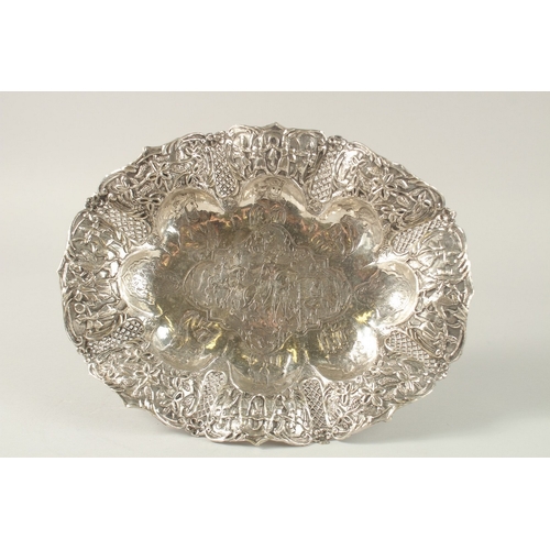 254 - A PERSIAN ENGRAVED AND CHASED SOLID SILVER FOOTED CENTREPIECE, with detachable stand, the bowl engra... 