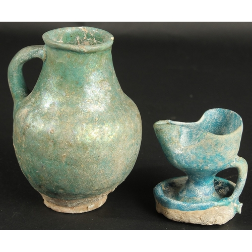 261 - A 12TH CENTURY PERSIAN KASHAN TURQUOISE GLAZED POTTERY JUG AND OIL LAMP, provenance: formerly proper... 