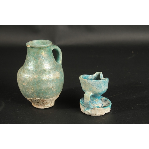 261 - A 12TH CENTURY PERSIAN KASHAN TURQUOISE GLAZED POTTERY JUG AND OIL LAMP, provenance: formerly proper... 