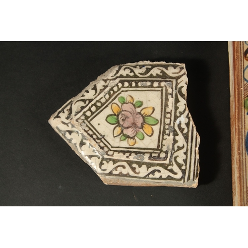 264 - A PERSIAN QAJAR GLAZED POTTERY TILE AND CORNER TILE (in three pieces), together with another glazed ... 