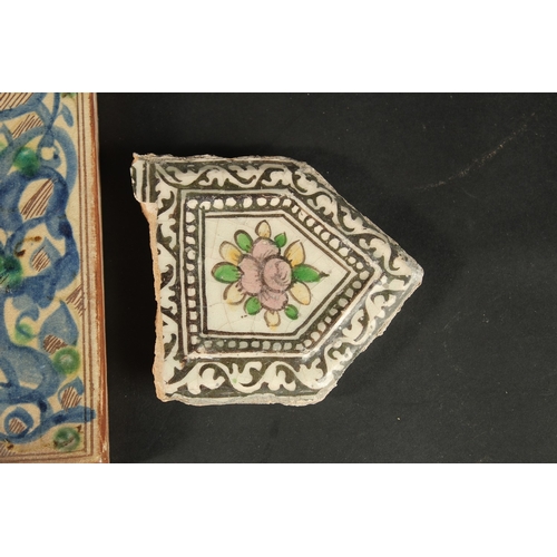 264 - A PERSIAN QAJAR GLAZED POTTERY TILE AND CORNER TILE (in three pieces), together with another glazed ... 