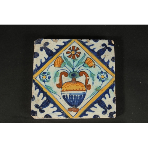 265 - A COLLECTION OF FOUR ITALIAN / EUROPEAN GLAZED POTTERY TILES, largest 20cm square.