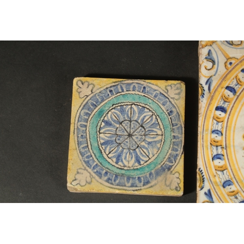 265 - A COLLECTION OF FOUR ITALIAN / EUROPEAN GLAZED POTTERY TILES, largest 20cm square.