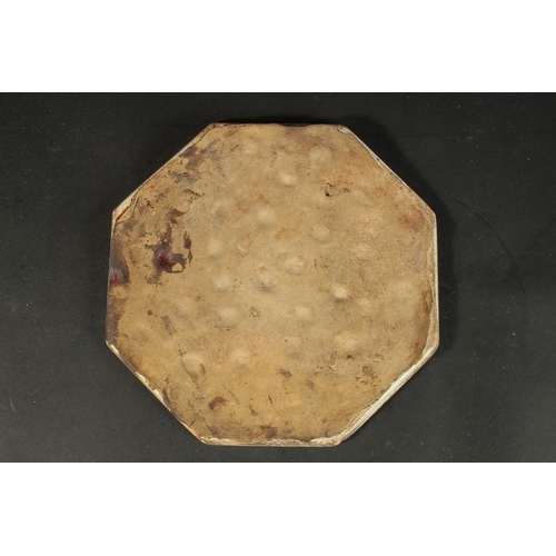 266 - AN ISLAMIC MARKET FRENCH OR ITALIAN GLAZED POTTERY OCTAGONAL TILE, painted with floral motifs, 23cm ... 