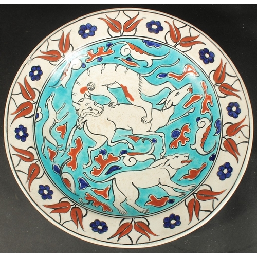 267 - AN EARLY 20TH CENTURY BOCH FRERES KERAMIS IZNIK STYLE GLAZED POTTERY PLATE, painted with animals and... 