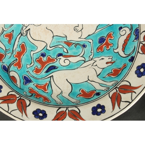 267 - AN EARLY 20TH CENTURY BOCH FRERES KERAMIS IZNIK STYLE GLAZED POTTERY PLATE, painted with animals and... 