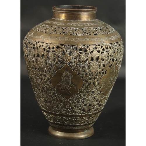 269 - A LARGE ISLAMIC PERSIAN OPENWORKED BRASS VASE, engraved with portraits and animals, 30cm high.