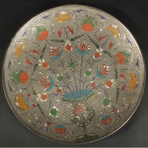 270 - AN INDIAN ENGRAVED AND ENAMELLED WHITE METAL FLORAL DISH, 29cm diameter.