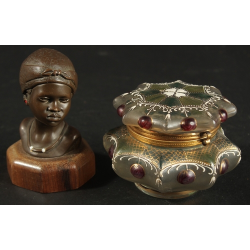 273 - AN AFRICAN BRONZE BUST TOGETHER WITH A DECORATIVE GLASS BOX, (2).