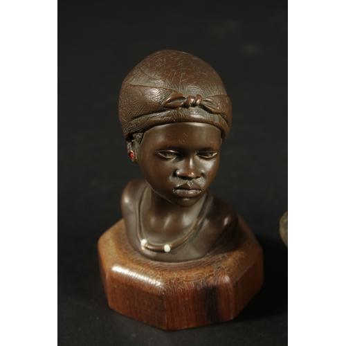 273 - AN AFRICAN BRONZE BUST TOGETHER WITH A DECORATIVE GLASS BOX, (2).