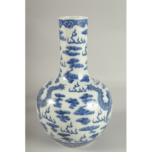 28 - A LARGE CHINESE BLUE AND WHITE PORCELAIN DRAGON VASE, the base with character mark, 36cm high.