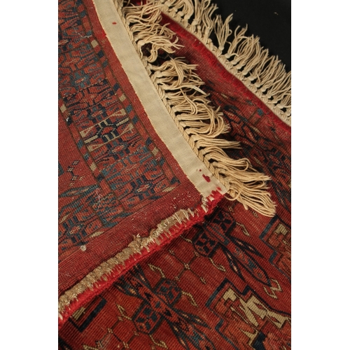 282 - A LATE 19TH CENTURY TEKKE RUG, 120cm x 46cm (excl. tassles).