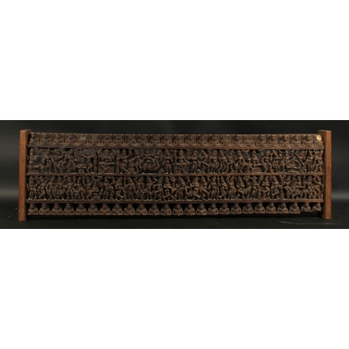 288 - A FINE LARGE 19TH CENTURY SOUTH INDIAN CARVED WOODEN PANEL, carved with rows of dancers. 97.5cm x 28... 