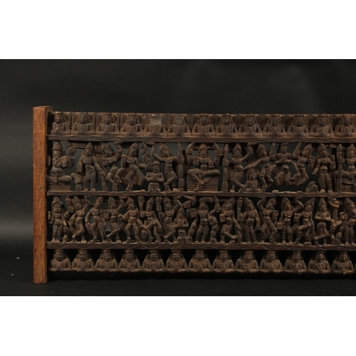 288 - A FINE LARGE 19TH CENTURY SOUTH INDIAN CARVED WOODEN PANEL, carved with rows of dancers. 97.5cm x 28... 