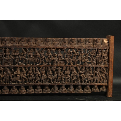 288 - A FINE LARGE 19TH CENTURY SOUTH INDIAN CARVED WOODEN PANEL, carved with rows of dancers. 97.5cm x 28... 