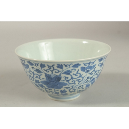 307 - A FINE CHINESE BLUE AND WHITE PORCELAIN BOWL, with six-character mark, 11.5cm diameter.