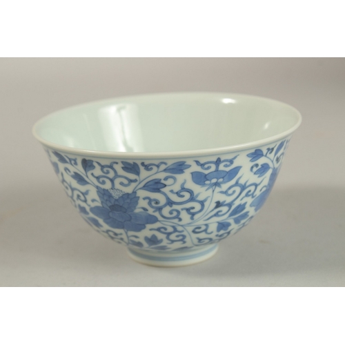 307 - A FINE CHINESE BLUE AND WHITE PORCELAIN BOWL, with six-character mark, 11.5cm diameter.