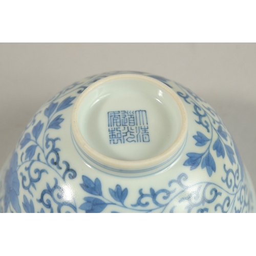 307 - A FINE CHINESE BLUE AND WHITE PORCELAIN BOWL, with six-character mark, 11.5cm diameter.