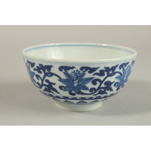 308 - A CHINESE BLUE AND WHITE PORCELAIN BOWL, with six-character mark, 12cm diameter.