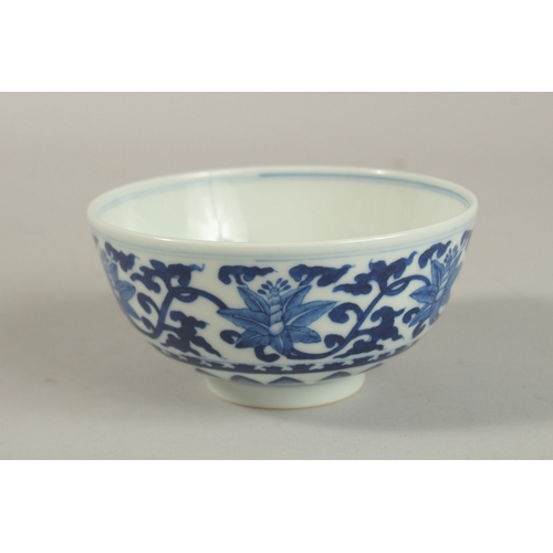 308 - A CHINESE BLUE AND WHITE PORCELAIN BOWL, with six-character mark, 12cm diameter.