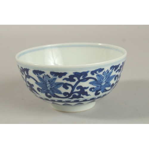 308 - A CHINESE BLUE AND WHITE PORCELAIN BOWL, with six-character mark, 12cm diameter.