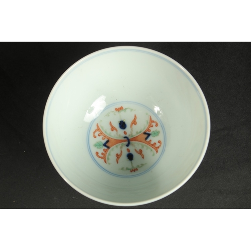 313 - A CHINESE DOUCAI PORCELAIN CUP, with six-character mark, 10cm diameter.