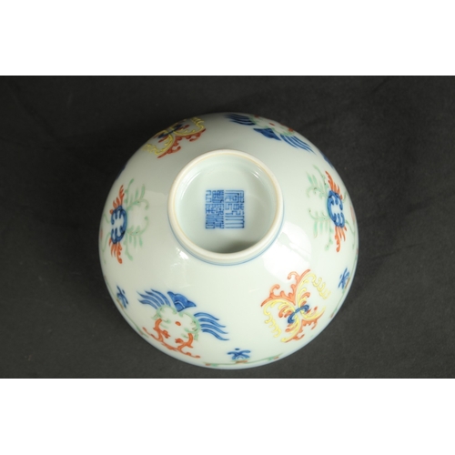 313 - A CHINESE DOUCAI PORCELAIN CUP, with six-character mark, 10cm diameter.