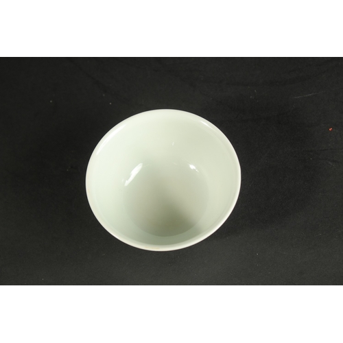 314 - A SMALL CHINESE BLUE AND WHITE PORCELAIN CUP, with character mark to base, 8cm diameter.