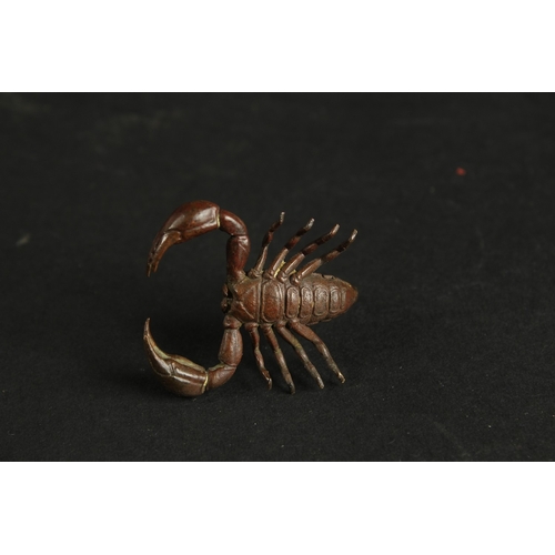 323 - A BRONZE OKIMONO OF A SCORPION.