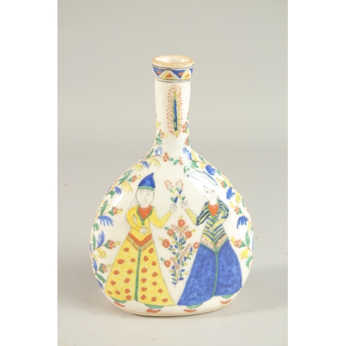 332 - A TURKISH KUTAHYA GLAZED POTTERY BOTTLE, painted with figures, 22cm high.