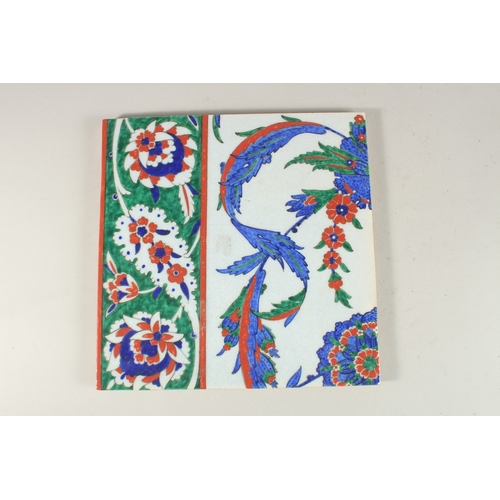 337 - A LARGE TURKISH IZNIK GLAZED POTTERY TILE, 27cm square.