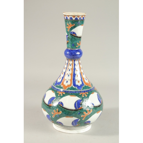 338 - A TURKISH IZNIK GLAZED POTTERY VASE, 33cm high.