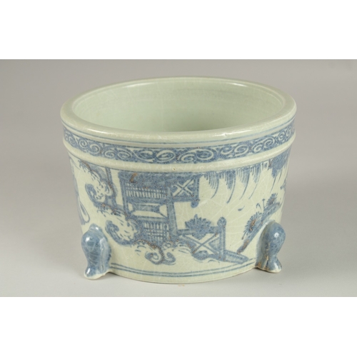 34 - A CHINESE BLUE AND WHITE PORCELAIN JARDINIERE, decorated with figures, 18.5cm diameter.