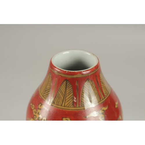 35 - A CHINESE RED GROUND PORCELAIN DOUBLE GOURD VASE, 23cm high.