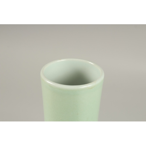 36 - A CHINESE CELADON GLAZE PORCELAIN FLORAL BOTTLE VASE, the base with character mark, 26cm high.