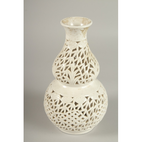 37 - A CHINESE PIERCED PORCELAIN DOUBLE GOURD VASE, 20.5cm high.