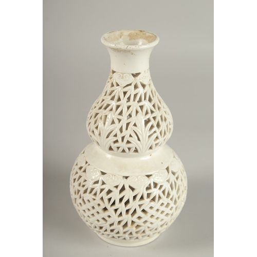 37 - A CHINESE PIERCED PORCELAIN DOUBLE GOURD VASE, 20.5cm high.