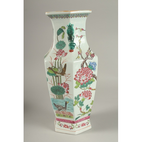 5 - A CHINESE FAMILLE ROSE PORCELAIN HEXAGONAL TWIN HANDLE VASE, 38.5cm high.