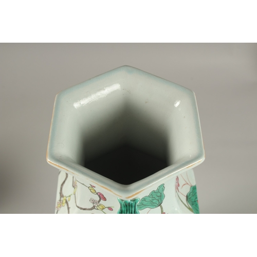 5 - A CHINESE FAMILLE ROSE PORCELAIN HEXAGONAL TWIN HANDLE VASE, 38.5cm high.