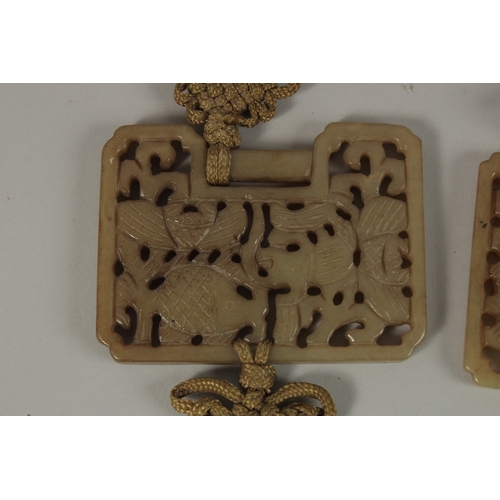 52 - TWO CHINESE CARVED AND PIERCED JADE PLAQUES, (2).