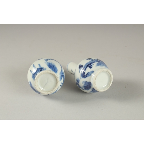 59 - A MINIATURE PAIR OF CHINESE BLUE AND WHITE PORCELAIN VASES, 8.5cm high.