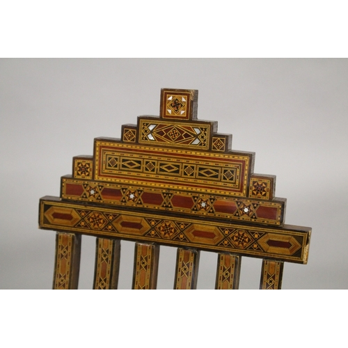 83 - A PAIR OF MOROCCAN MARQUETRY INLAID WOODEN FOLDING CHAIRS.