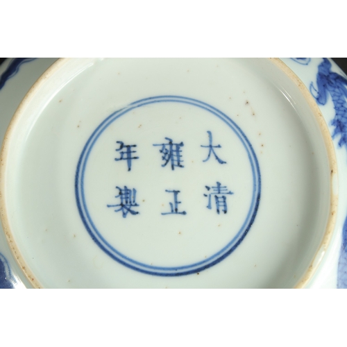 85 - A PAIR OF CHINESE KANGXI BLUE AND WHITE PORCELAIN DRAGON DISHES, each base with character mark, 15cm... 