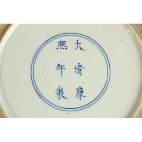 93 - A CHINESE FAMILLE VERTE PORCELAIN DRAGON PLATE, the base with six-character mark, 28cm diameter.